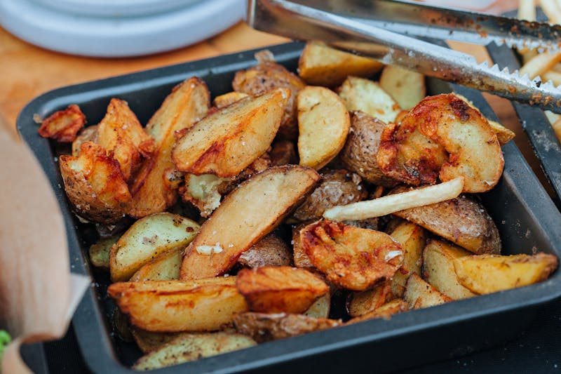 Crispy seasoned potato wedges side dish