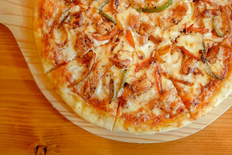 Green chile chicken pizza — New Mexico specialty at Dions